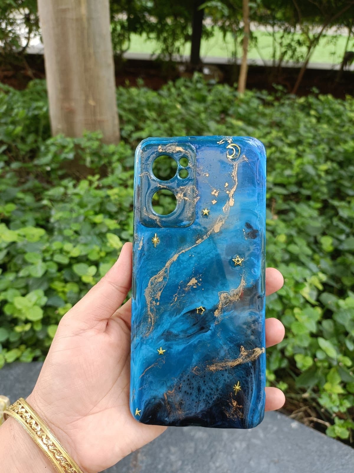 Blue and gold ocean resin phone case