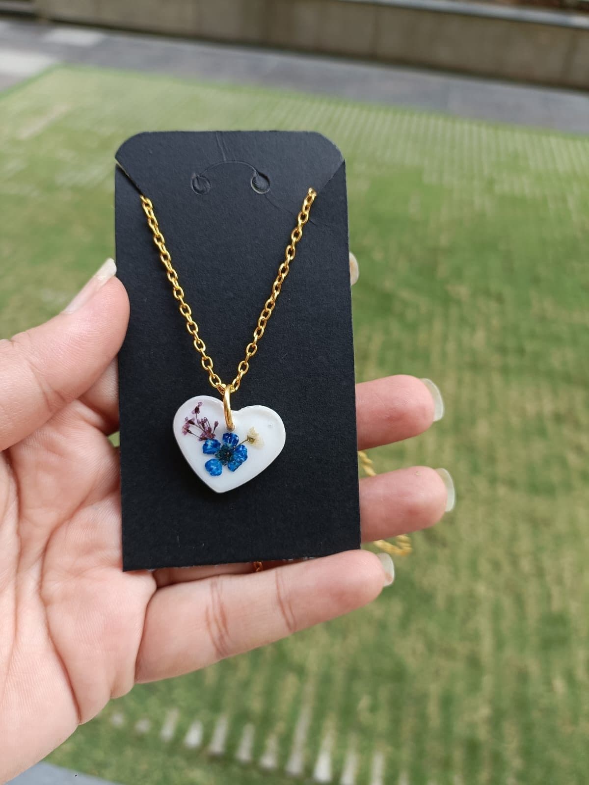 Heart-shaped resin pendant necklace