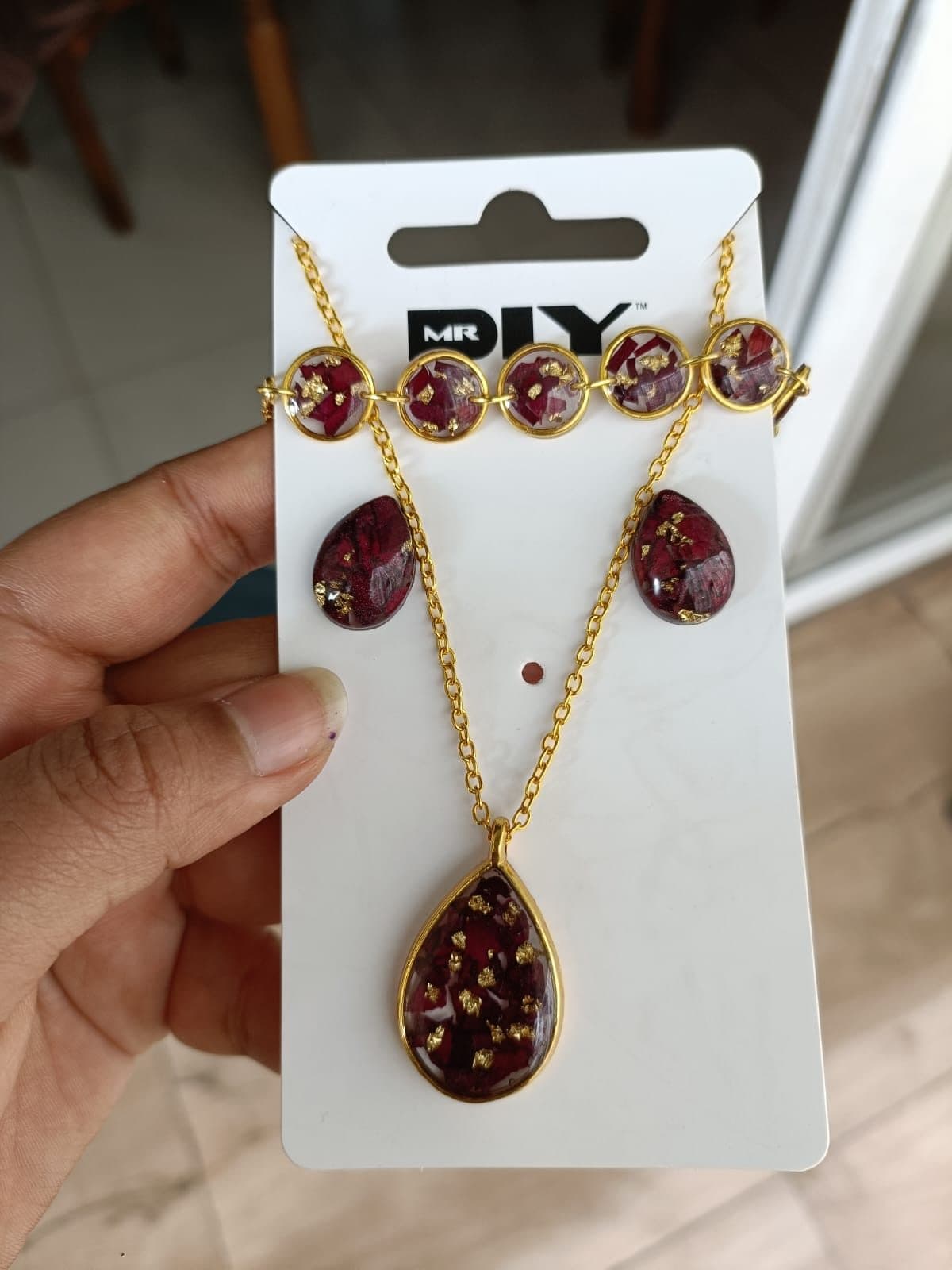 Maroon teardrop resin necklace with matching earrings